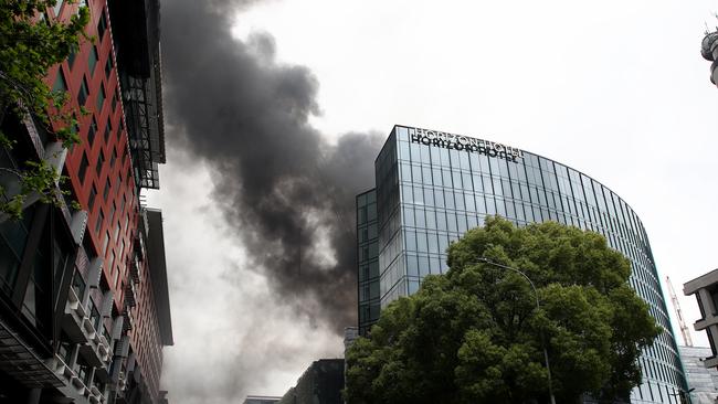 Smoke is seen coming from the SkyCity Convention Centre after a fire broke out on the roof top on October 22, 2019 in Auckland, New Zealand. (Photo by Phil Walter/Getty Images)