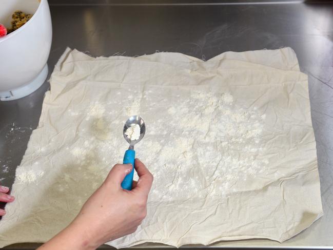 Use cloth, flour side away from the bowl, to line a pudding basin. Picture : Nicki Connolly