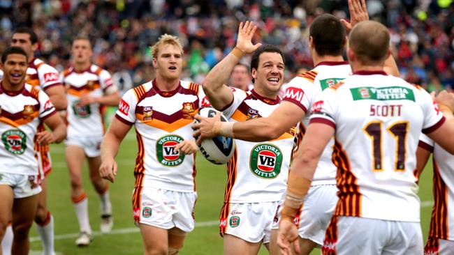 Country's Jarrod Mullen celebrates Country's James McManus scores a try during the City vs Dubbo at Caltex Oval , Dubbo .Picture Gregg Porteous