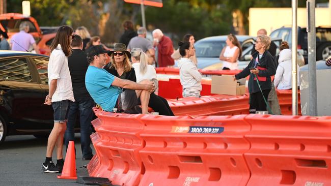 Residents gather at the NSW-QLD border in Coolangatta. Picture: Lyndon Mechielsen