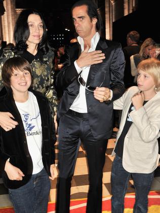 Happier times ... Arthur (right) with his famous family at an event in London in 2013.