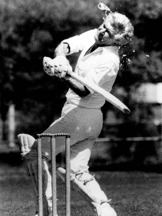 Prime Minister Bob Hawke is hit by a cricket ball during friendly cricket match against the press gallery in Canberra in 1984.