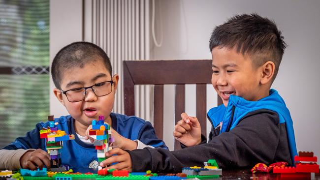 Jaxon Hach and his brother Hugo play with Lego. Picture: Jake Nowakowski