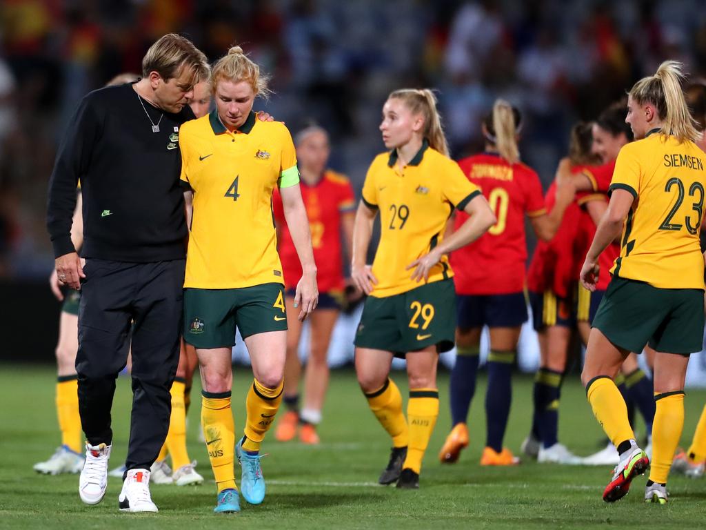 Matildas coach Tony Gustavsson consoles defender Clare Polkinghorne after Australia’s 7-0 loss to Spain. Picture: Fran Santiago/Getty Images