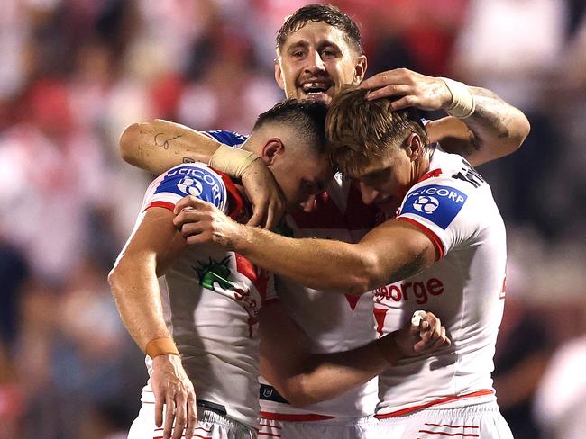 WOLLONGONG, AUSTRALIA - MARCH 30: Zac Lomax and Kyle Flanagan of the Dragons celebrate victory during the round four NRL match between St George Illawarra Dragons and Manly Sea Eagles at WIN Stadium, on March 30, 2024, in Wollongong, Australia. (Photo by Mark Metcalfe/Getty Images)