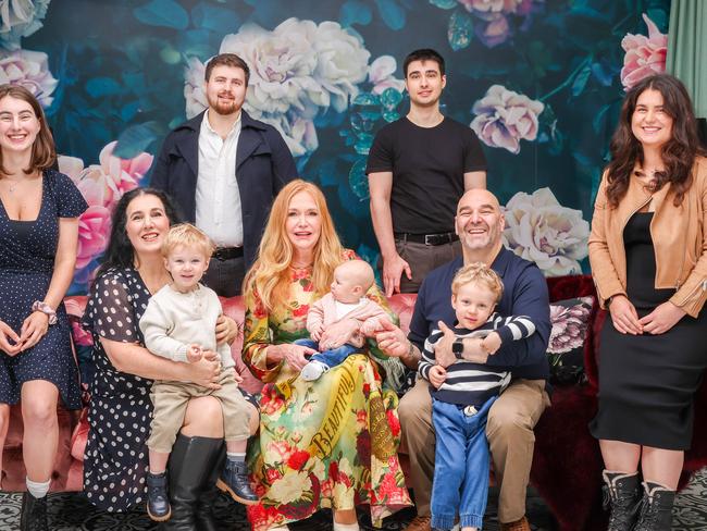 And then there were eight: From left: Natasha Coxhill, James Coxhill, Marc Coxhill, and Christine Coxhill. Rosie Giampaolo with Leonardo, Dr Lynn Burmeister (middle) with baby Leia, Rob Giampaolo with Luca. Picture: Brendan Beckett