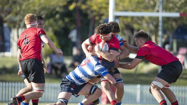 Fergus Nasser can’t escape Nudgee’s defence. Picture: Renae Droop