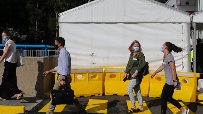 Health Care workers seen leaving the Westmead Hospital Vaccination Hub after being among the first to receive the jab today. Picture: NCA NewsWire / Gaye Gerard