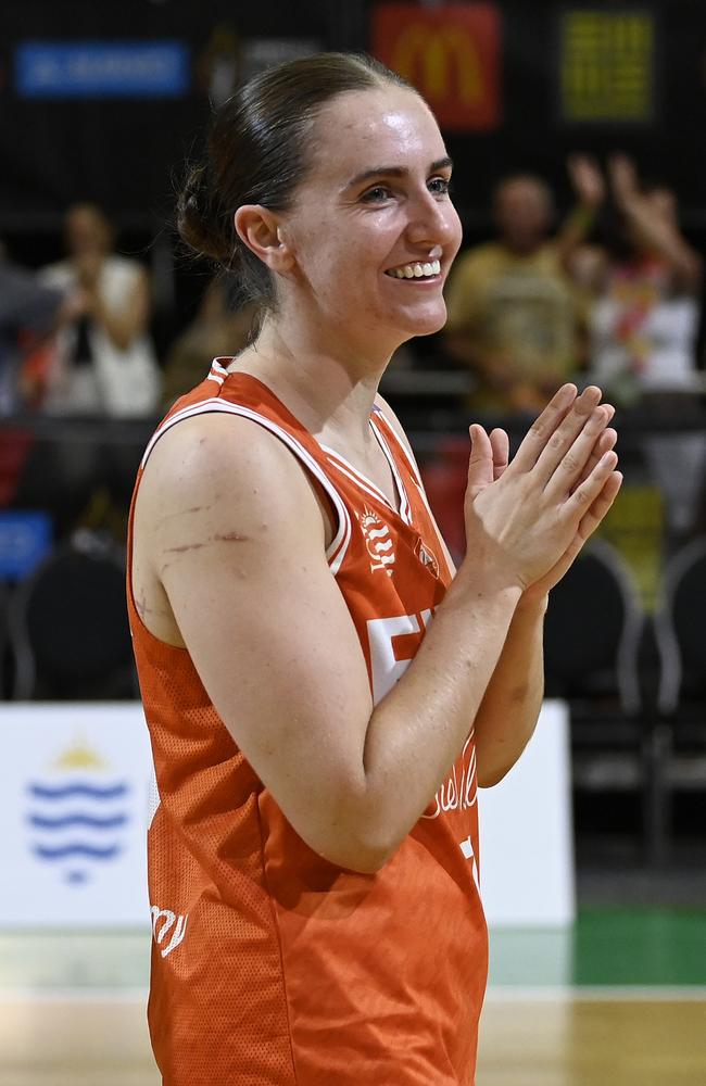 Courtney Woods of the Fire celebrates after winning the round 12 WNBL match between Townsville Fire and Canberra Capitals at Townsville Entertainment Centre on January 18, 2025, in Townsville, Australia. (Photo by Ian Hitchcock/Getty Images)