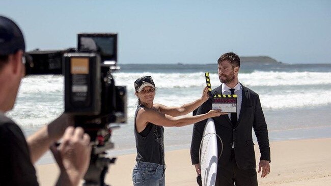 Chris Hemsworth on set of the ad filmed by Fotomedia at a Northern NSW beach. Photo: Fotomedia