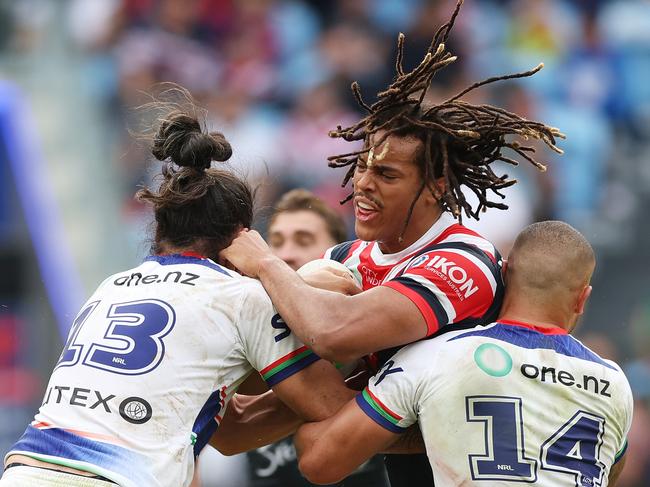 SYDNEY, AUSTRALIA - MAY 12: Dominic Young of the Roosters is tackled during the round 10 NRL match between Sydney Roosters and New Zealand Warriors at Allianz Stadium, on May 12, 2024, in Sydney, Australia. (Photo by Mark Metcalfe/Getty Images)