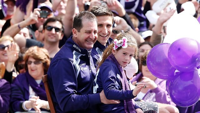 Ross Lyon and Matthew Pavlich soak up the atmosphere at the Grand Final parade.