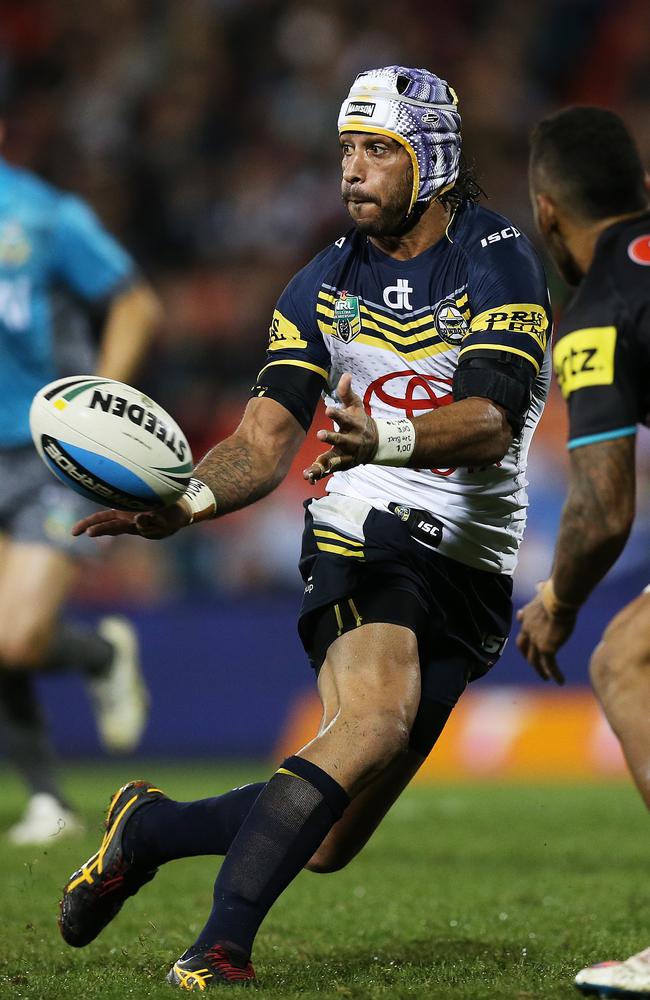 Cowboys Johnathan Thurston throws a pass that results in a try during NRL match Penrith Panthers v Nth Qld Cowboys at Penrith. pic. Phil Hillyard