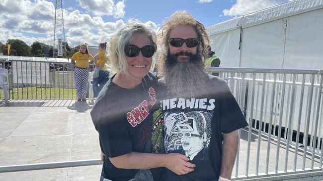 Fans of The Meanies decked out in merch enjoy Groovin the Moo.