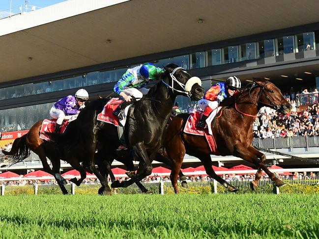 Bella Nipotina mows down I Wish I Win to win the Group 1 Doomben 10,000 for jockey Craig Williams. Picture. Grant Peters - Trackside Photography