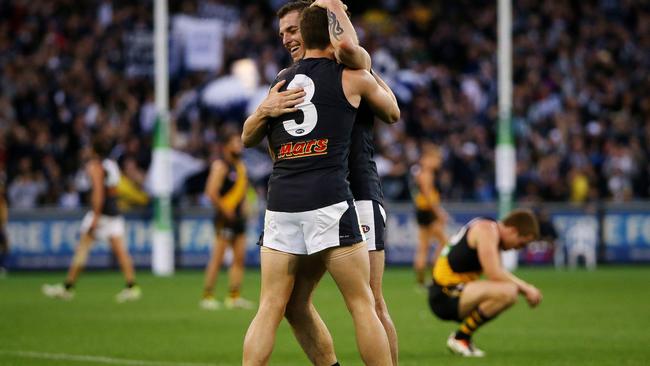 Carlton players celebrate their elimination final win against Richmond in 2013.