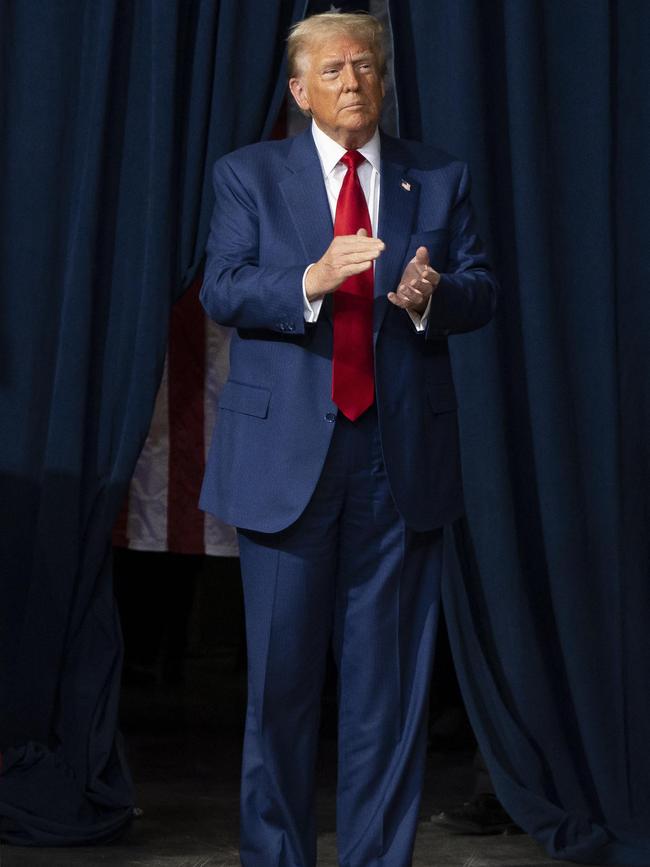 Donald Trump takes to the stage at a rally at t Findlay Toyota Center in Arizona. Picture: Getty Images