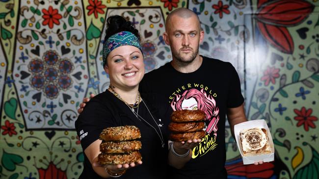 Co-owners of Bury Me Standing cafe on Grafton Street, Alesha Peckels and Cohen Bassingthwaighte, specialise in making sweet and savoury bagels. Picture: Brendan Radke