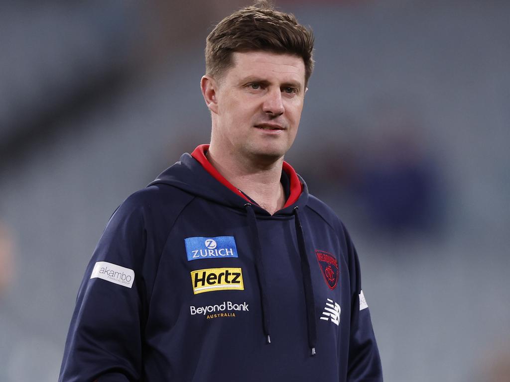 MELBOURNE, AUSTRALIA - AUGUST 23: Melbourne assistant coach Andrew McQualter looks on before during the round 24 AFL match between Melbourne Demons and Collingwood Magpies at Melbourne Cricket Ground, on August 23, 2024, in Melbourne, Australia. (Photo by Darrian Traynor/Getty Images)