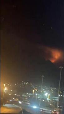 South Africa’s iconic Table Mountain ‘glowing’ as wildfires are fanned by strong winds