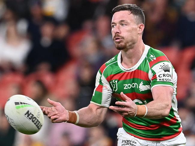 BRISBANE, AUSTRALIA - JUNE 17: Damien Cook of the Rabbitohs offloads during the round 15 NRL match between the Brisbane Broncos and the South Sydney Rabbitohs at Suncorp Stadium, on June 17, 2021, in Brisbane, Australia. (Photo by Bradley Kanaris/Getty Images)