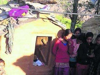 Roshani Tiruwa's family and friends gather after she was found dead in the hut after starting a fire to keep warm. She was in the third day of mendstuating. Picture: Ashok Dahal