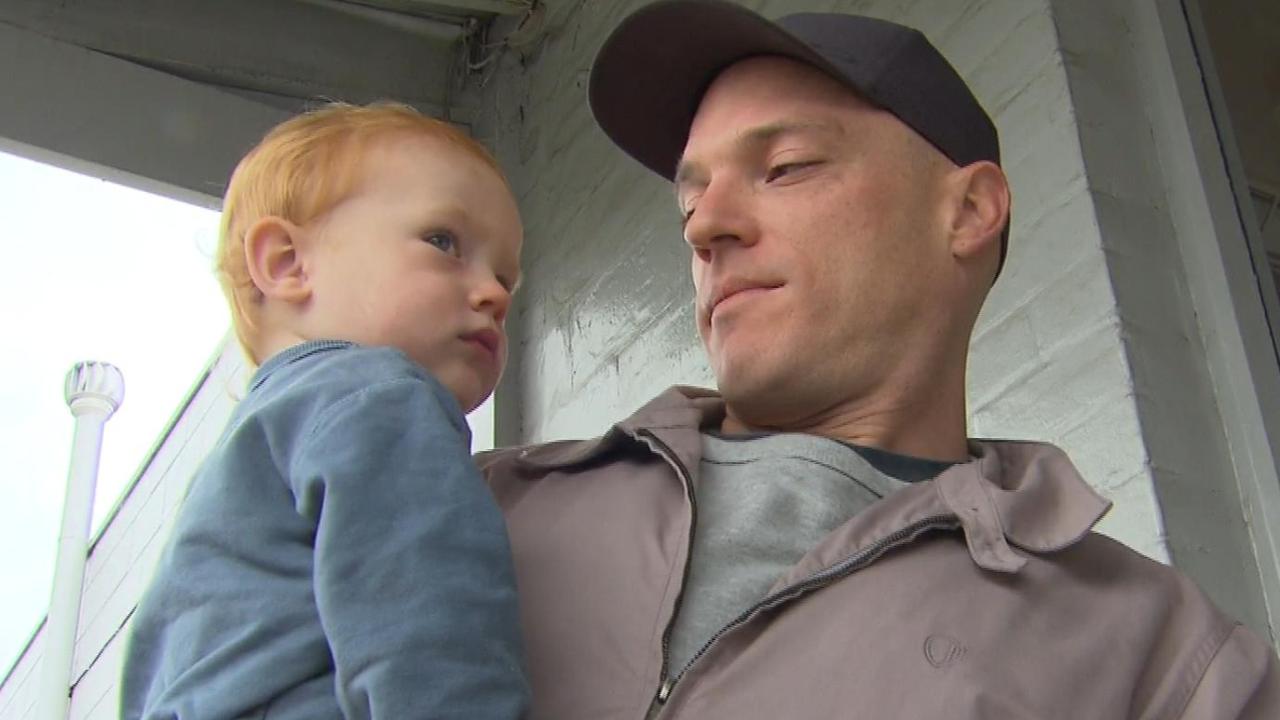 Baby Arli reunited with his dad. Picture: 7NEWS