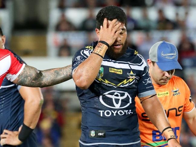 Dragons' Tariq Sims acknowledges John Asiata of the Cowboys as Asiata leaves the field with a possible concussion during the Round 19 NRL match between the North Queensland Cowboys and St George Illawarra at 1300SMILES Stadium in Townsville, Saturday, July 21, 2018. (AAP Image/Michael Chambers) NO ARCHIVING, EDITORIAL USE ONLY