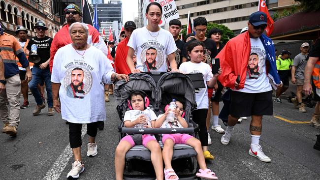 The family of deceased Cross River Rail Worker Daniel Sa’•u, his wife Geraldine and daughters Clover and Thira, taking part in a CFMEU• union rally in Brisbane. Picture: Dan Peled / NCA NewsWire