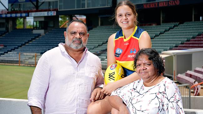 Adelaide recruit Danielle Ponter with mum Susie and uncle Michael Long.