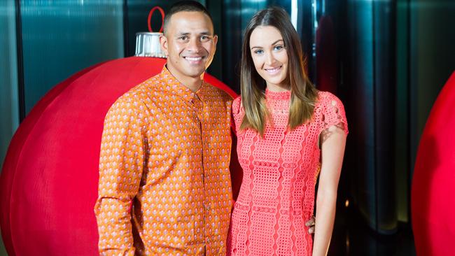 Usman Khawaja and partner Rachel McLennan before the Boxing Day Test. Picture: Stuart Walmsley