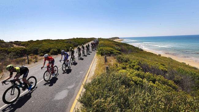 Cadel Evans Road Race in Geelong.  The peloton make their way past 13th beach     .Pic: Michael Klein