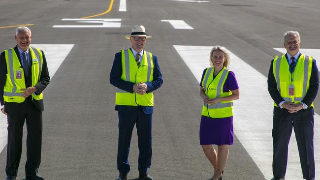 Sunshine Coast Airport Expansion Project Director Ross Ullman, Mayor Mark Jamieson, former Queensland Tourism Minister Kate Jones and Sunshine Coast Airport CEO Andrew Brodie pictured at the new runway in June, 2020.