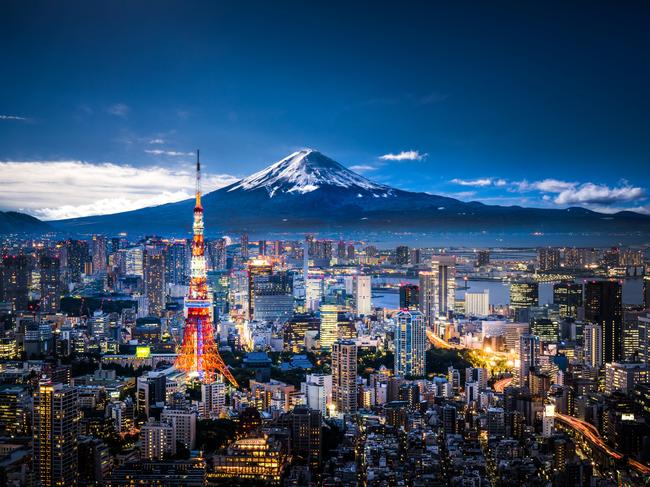 View of Mt. Fuji and Tokyo skyline at dusk.Escape 13 August 2023Why I travelPhoto - iStock