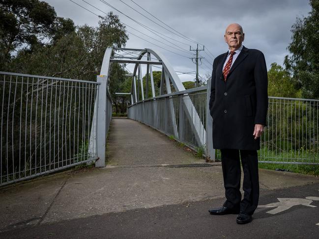 Rowland Legg at the footbridge over Moonee Ponds Creek — the shooter’s escape route. Picture: Jake Nowakowski