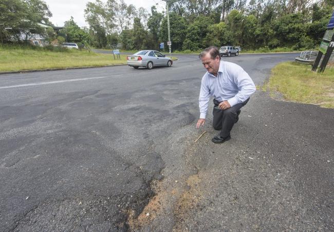 Cr Jim Simmons looks over one of the sections of road on the corner of Jubilee Street and Cameron St. Frustrated at the lack of action by council to fix the road despite years of complaints, Mr Simmons says he will vote against the Works report at monthly council meetings until something is done. Picture: Adam Hourigan