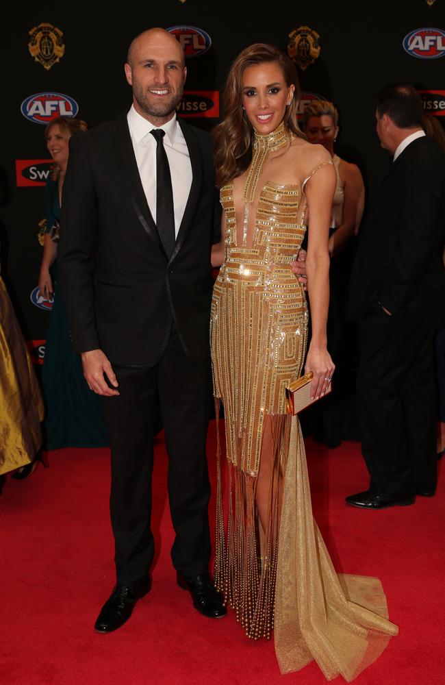 Chris Judd of Carlton and wife Rebecca Judd arrive on the red carpet for the 2015 AFL Brownlow Medal presentation held at Crown Casino on Monday, September 28, 2015, in Melbourne, Victoria, Australia. Picture: Tim Carrafa