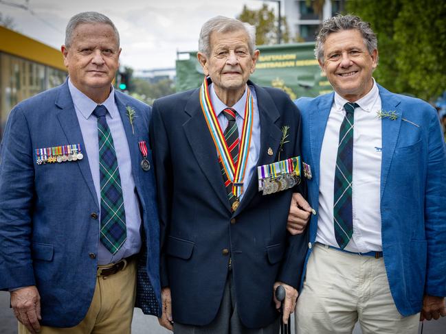 ADELAIDE, SOUTH AUSTRALIA - Advertiser Photos April 25, 2025 - 2025 ANZAC Day Parade in South Australia. Patrick Forbes flanked by two of his sons L to R John and Richard. Picture: Emma Brasier