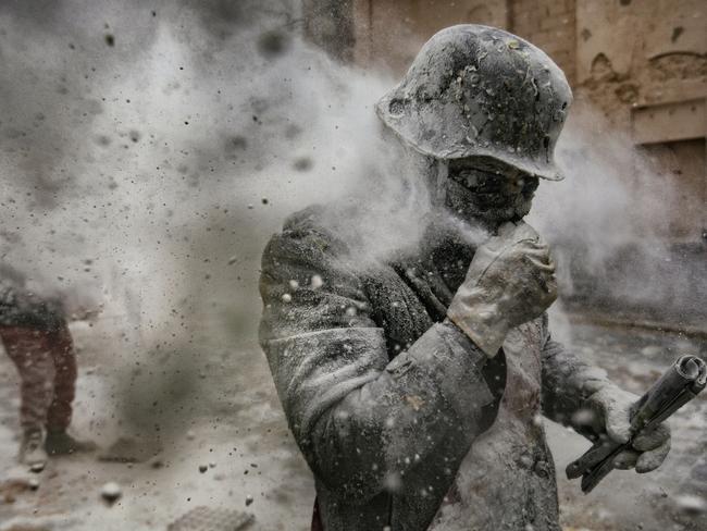 People - Second Prize, Stories Picture: Antonio Gibotta, Agenzia Controluce Title: Enfarinat Story: On 28 December each year, the “Floured War” takes place in Ibi in the province of Alicante, Spain. During the festival, the citizens are divided into two groups: the ‘Enfarinat’ (the floured) group simulates a coup d’etat and a second group tries to calm the rebellion. The 200-year-old tradition is known as “Els Enfarinats”, marking the biblical Massacre of the Innocents by King Herod. Each 28th december, in Ibi - province of Alicante, in Spain -, the “The floured’s war” takes place.