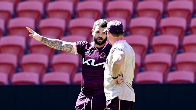 Coach Kevin Walters talks tactics with Adam Reynolds. Picture: Bradley Kanaris/Getty