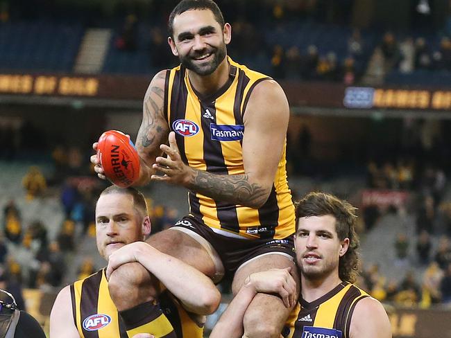 Shaun Burgoyne is chaired from the field by premiership teammates Jarryd Roughead and Ben Stratton after game 350. Picture: Michael Klein