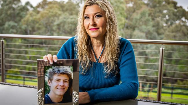 Sharlene Lynch with a photo of her son Scott, a teen who took his own life in 2011, pictured on August 12th, 2022, at her Windsor Garden home.Picture: Tom Huntley