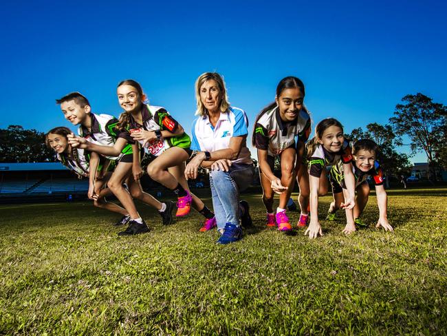 Glynis Nunn with Ashmore Little Athletics kids. Picture: NIGEL HALLETT