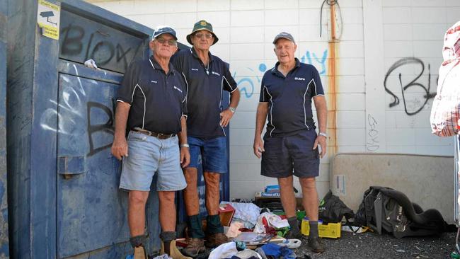 CONTAINERS TRASHED: Lifeline volunteers Darryl Frizzell, Don Lee and Clive Jackman with the Lifeline donation containers. Picture: Meg Gannon