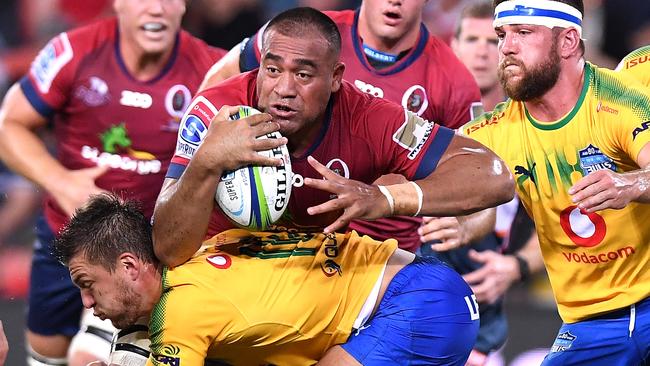 BRISBANE, AUSTRALIA - MARCH 10:  Caleb Timu of the Reds attempts to break through the defence during the round four Super Rugby match between the Reds and the Bulls at Suncorp Stadium on March 10, 2018 in Brisbane, Australia.  (Photo by Bradley Kanaris/Getty Images)