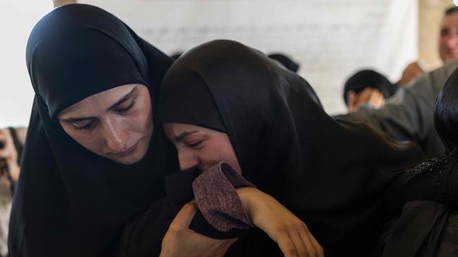 Lebanese women mourn during the funeral ceremony of five civilians who lost their lives in an Israeli airstrike on the town of Khodor, in Lebanon’s eastern Bekaa Valley. Picture: AFP