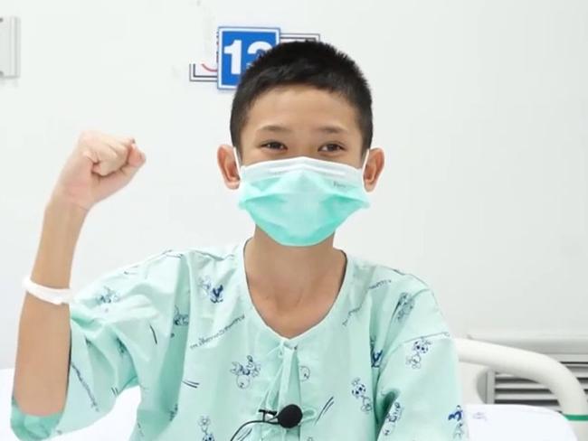 Mongkol Boonpiem, 13, one of the boys shows he is recovering well in hospital. Picture: AFP