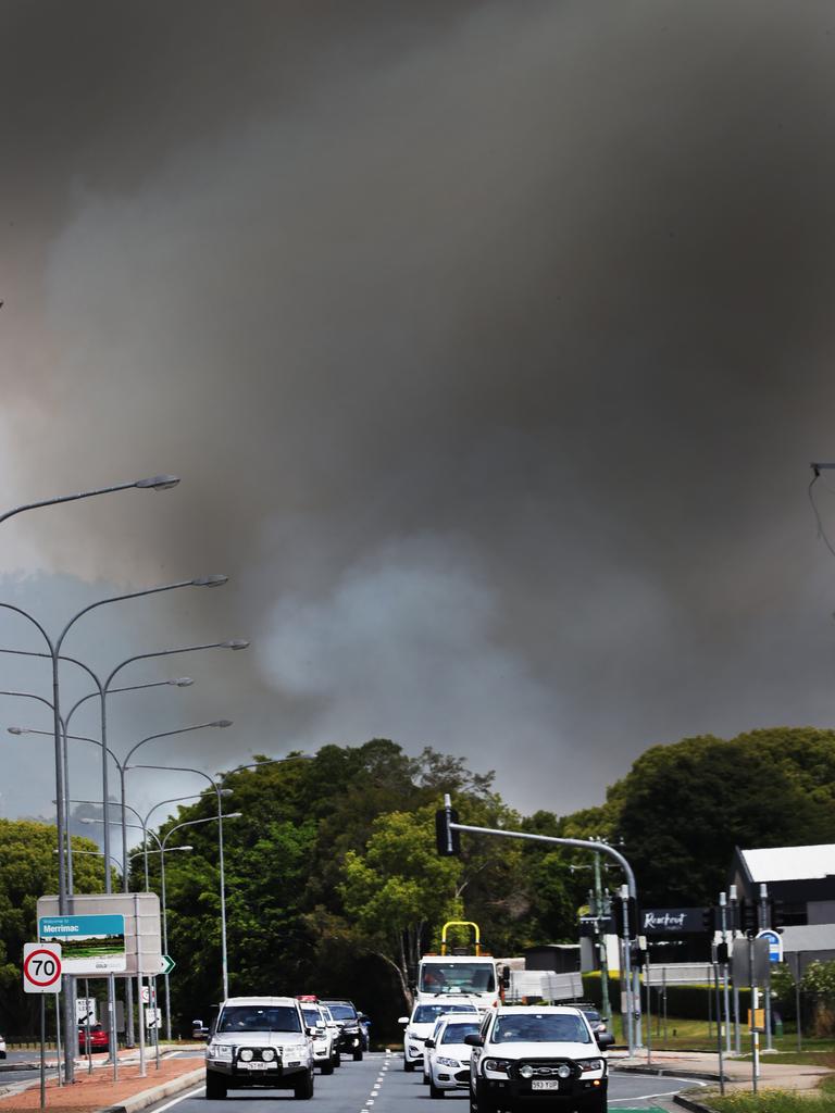 Grass Fires in the Carrara and Merrimac area kept Emergency Services and residents on alert during Tuesday. Picture Glenn Hampson