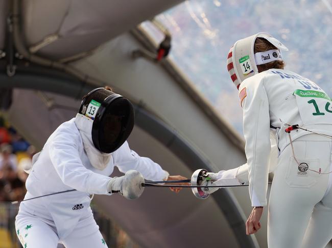 Chloe Esposito of Australia (left) and Margaux Isaksen of the US compete during the fencing.