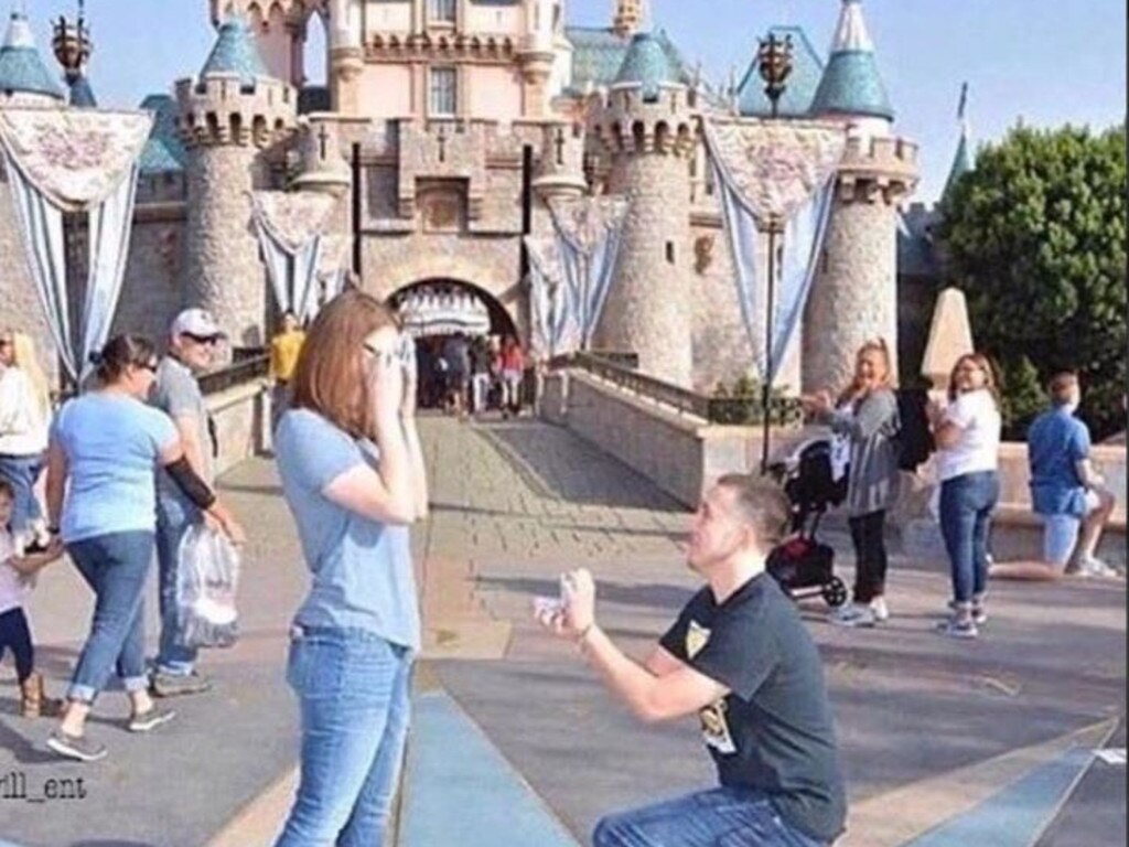 Disney parks are a pretty popular proposal location – as evidenced by the dude on one knee on the right of the picture.